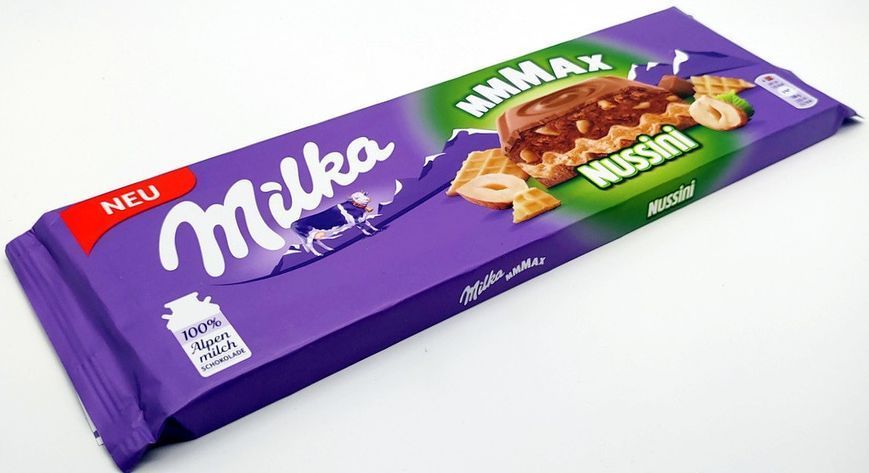 Молочная шоколадка Milka Nussini с начинкой из лесных орехов и вафель 270 грамм 306004 фото