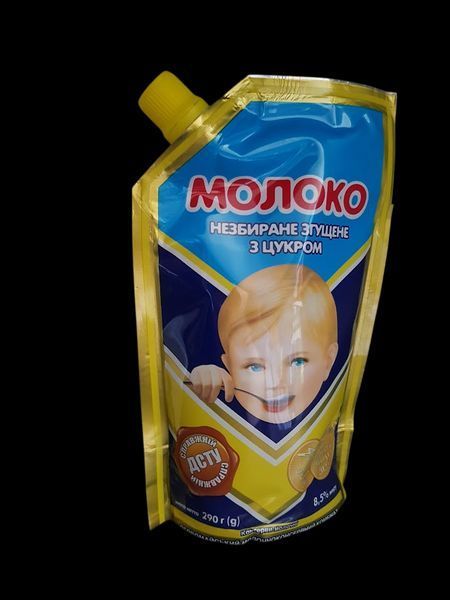 Згущене молоко Першомайський МКК цільне з цукром ДСТУ 290 дой-пак 341010 фото