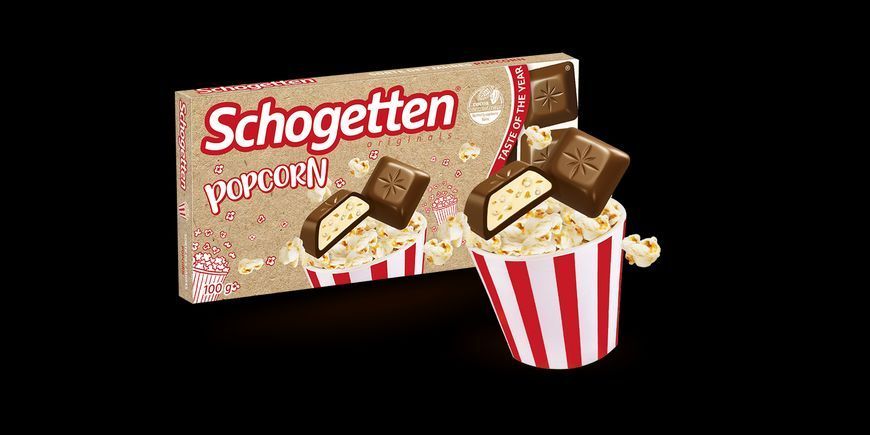 Молочный шоколад Schogetten Popcorn Taste of the Year с кусочками попкорна 100 грамм 301002 фото