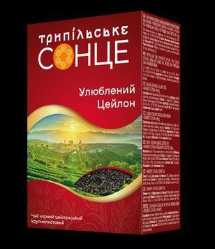 Чай Майский в новом дизайне Трипільське сонце Любимый цейлон крупнолистовой 180 грамм 128003 фото