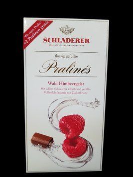 Шоколадні цукерки Schladerer Pralines з малиновим лікером і вишневим бренді Kirschwasser у молочному шоколаді 150 г 305002 фото