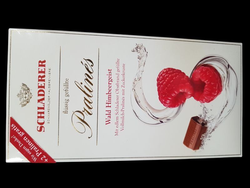 Шоколадные конфеты Schladerer Pralines с малиновым ликёром и вишнёвым бренди Kirschwasser в молочном шоколаде 150 г 305002 фото